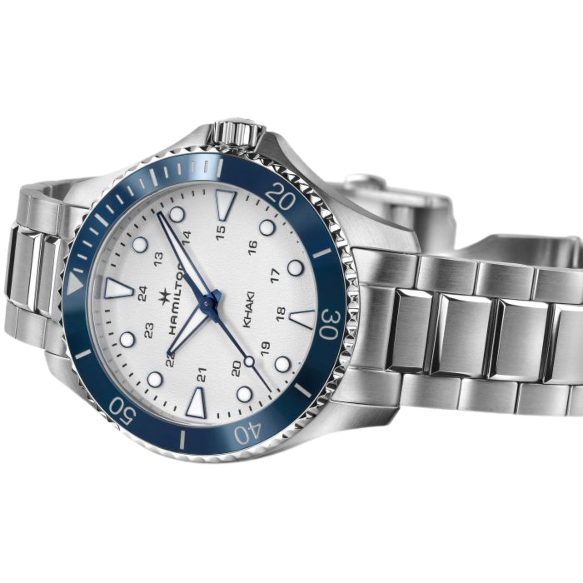Hamilton Khaki automatic watch with white dial and blue bezel, steel bracelet in side view.