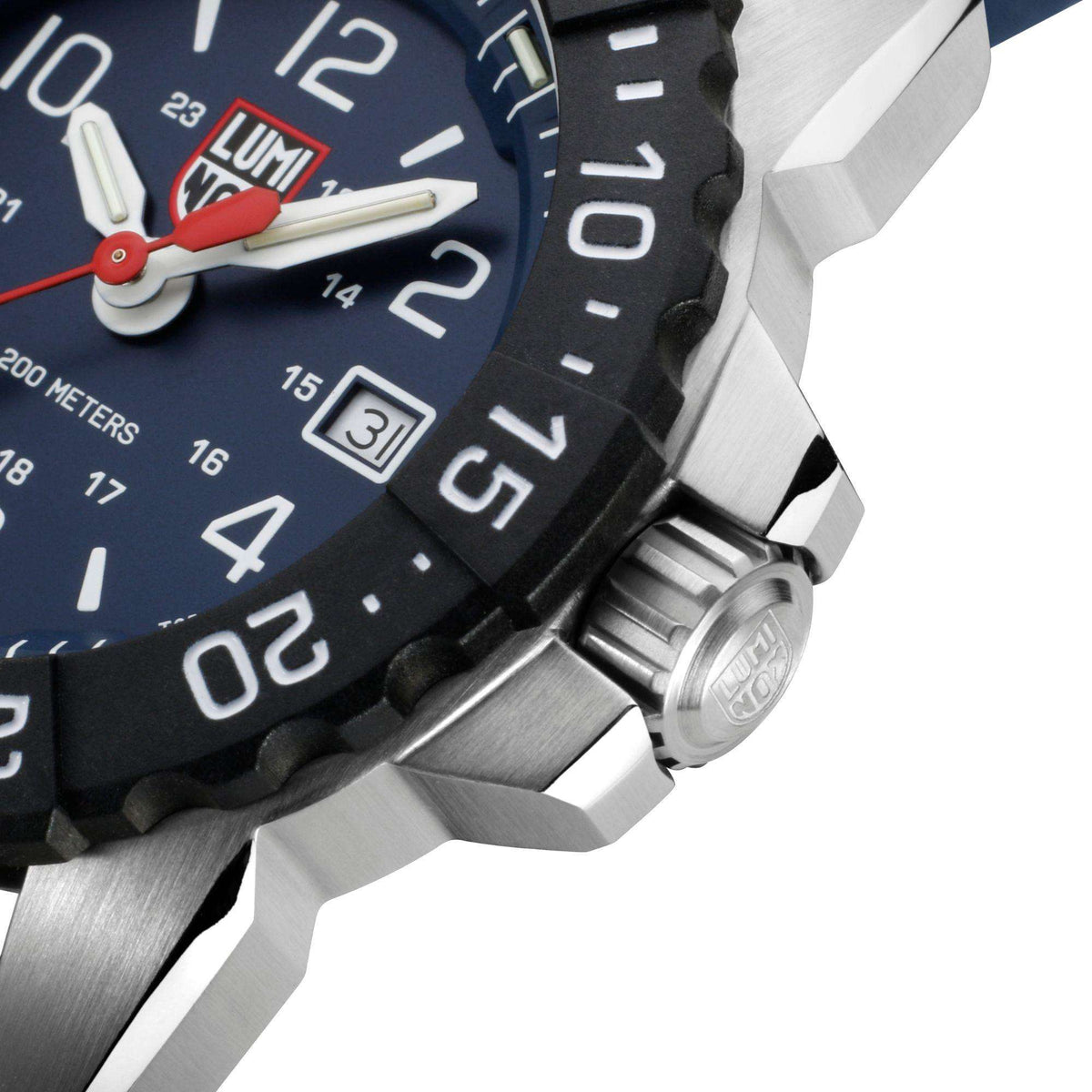 Close-up of navy dial quartz watch with date window and stainless steel crown