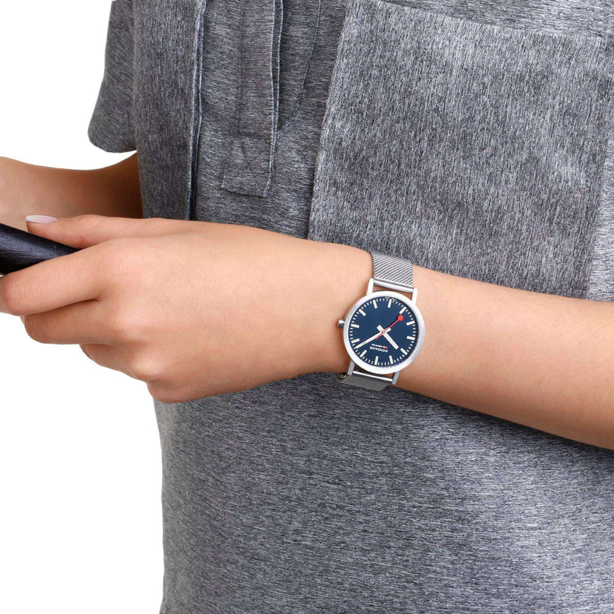 Mondaine wristwatch with deep ocean blue dial and silver mesh bracelet