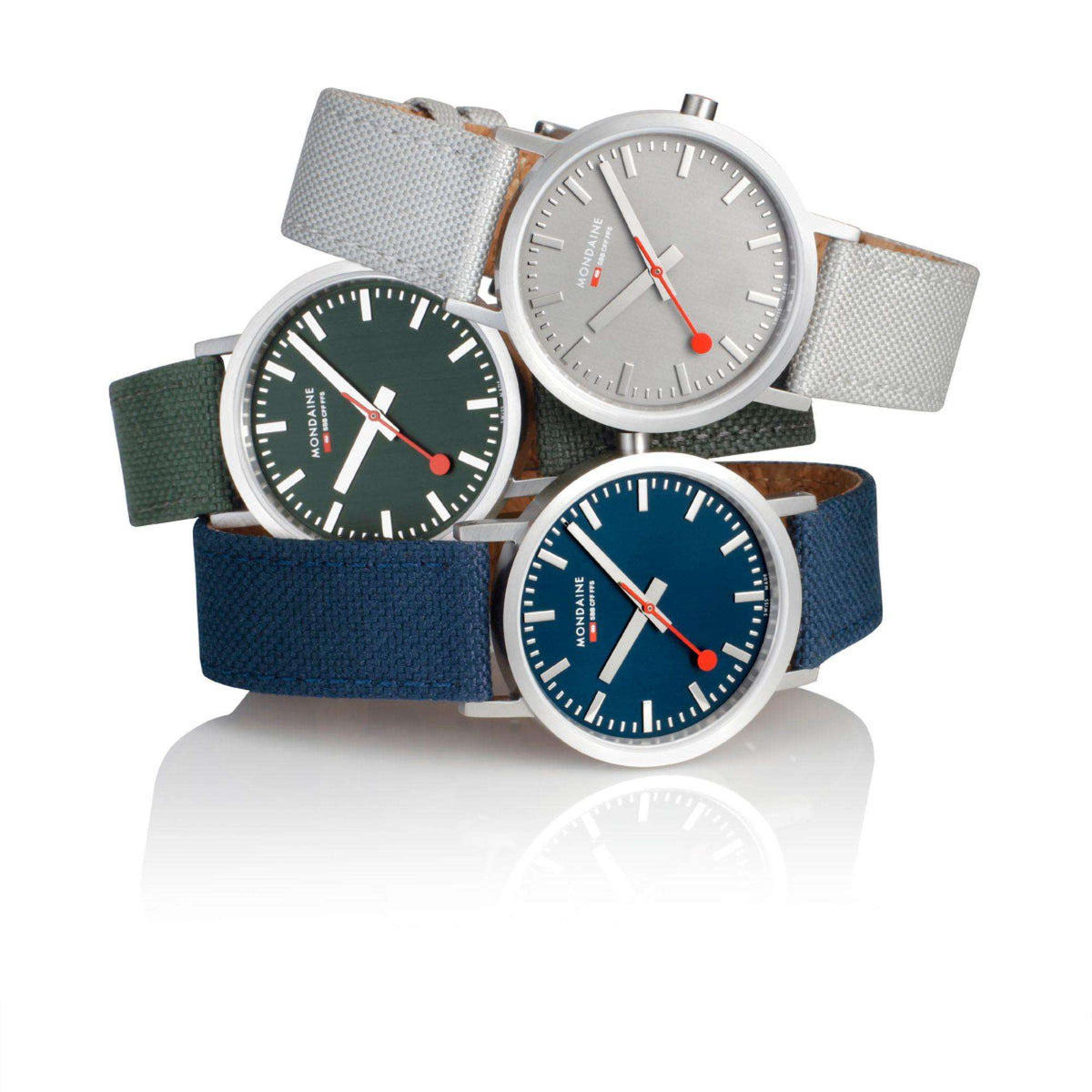 Assorted watches on straps: green, blue, and gray with round silver cases and red accents