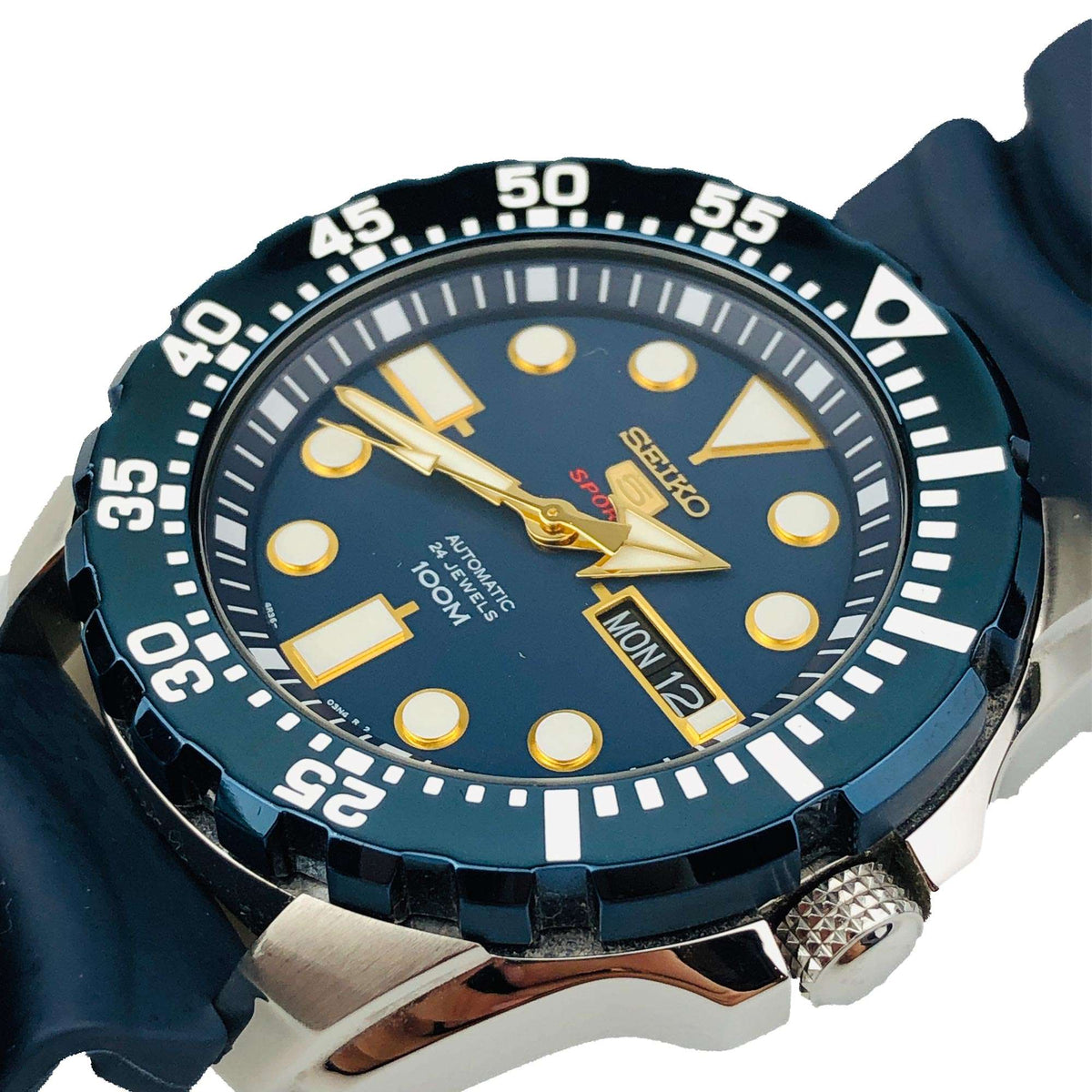 Men's Seiko 5 Sports automatic diver-style watch with blue dial, bezel, and date window
