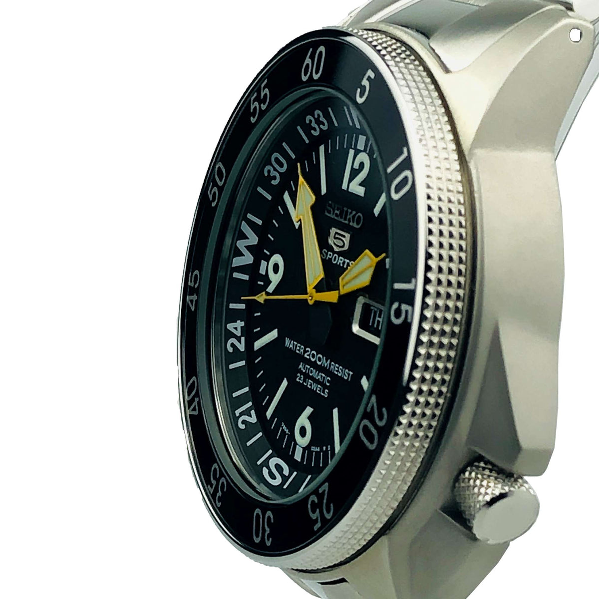 Men's Seiko 5 Sports Land Shark watch angled view, steel case, textured bezel edge.