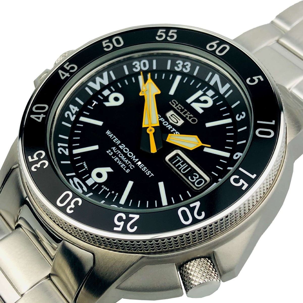 Men's Seiko 5 Sports Land Shark watch close-up, black dial, yellow hands, date display.