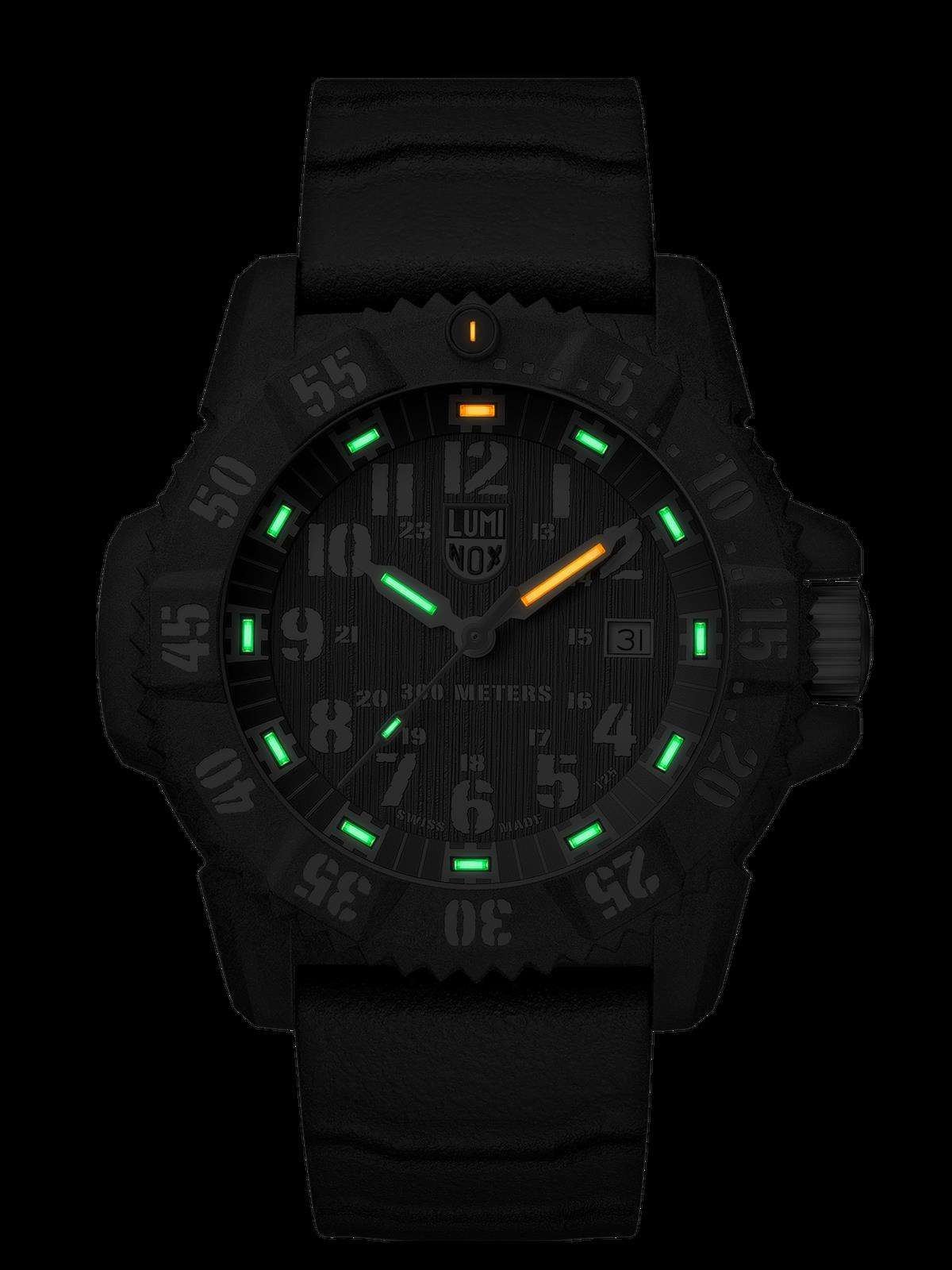 Carbon watch with black dial and glowing green hour markers, orange seconds hand, black strap.
