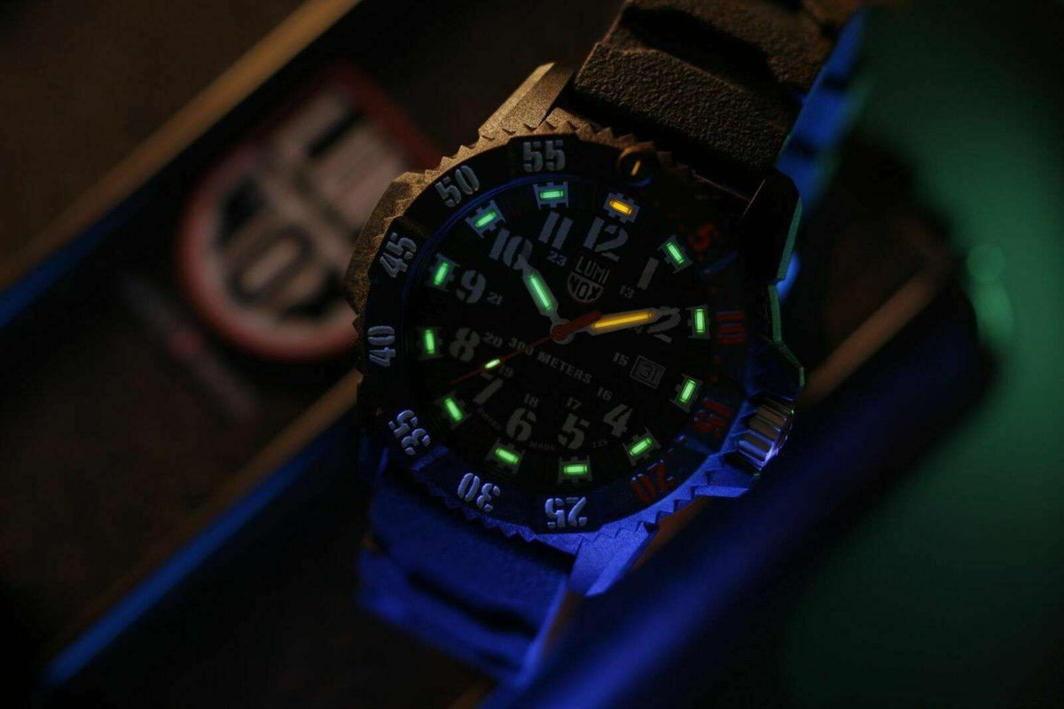 Men's black quartz watch with glowing markers and black silicone strap
