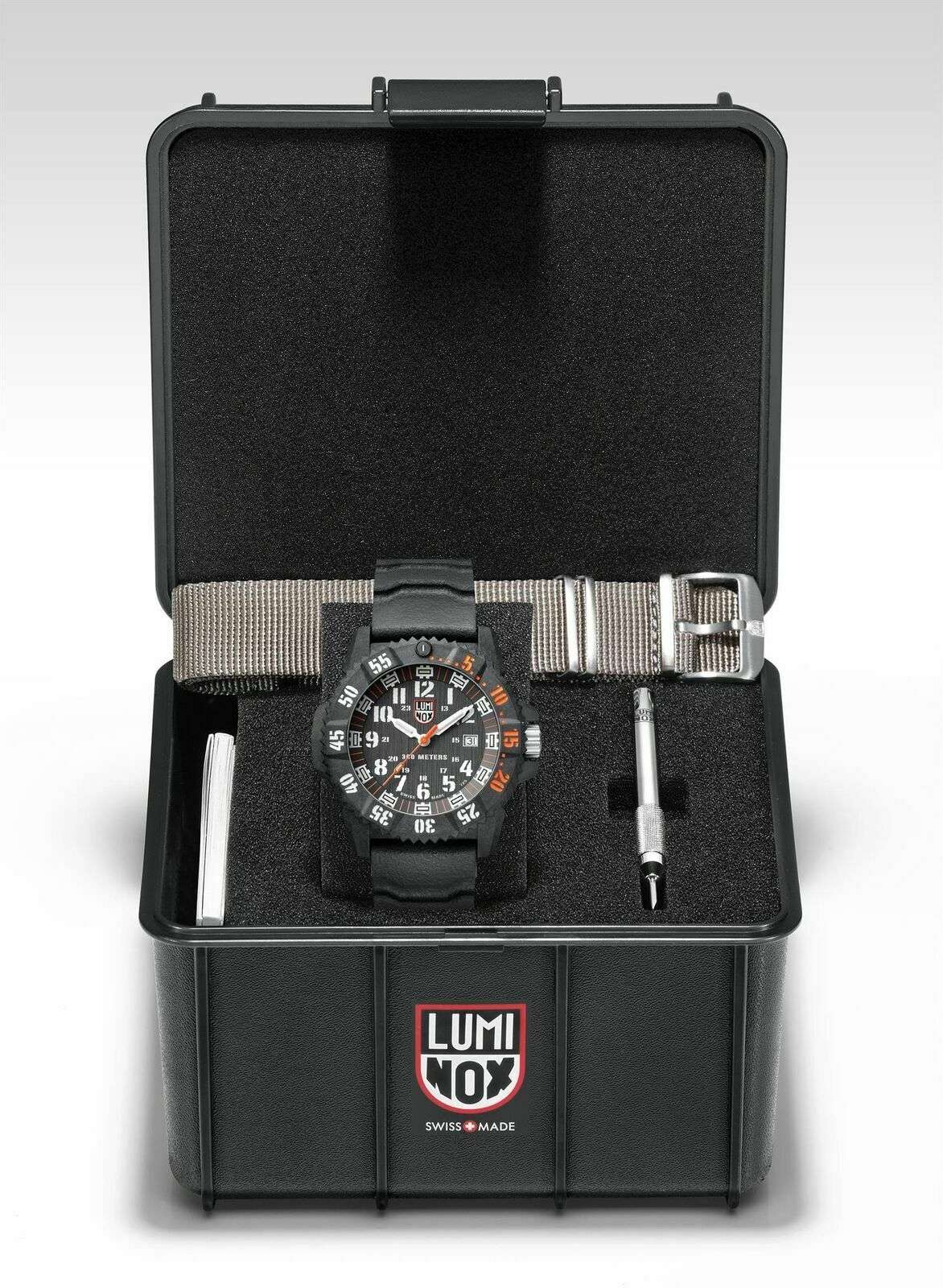 Men's black quartz watch with orange-tipped hands in a black storage case