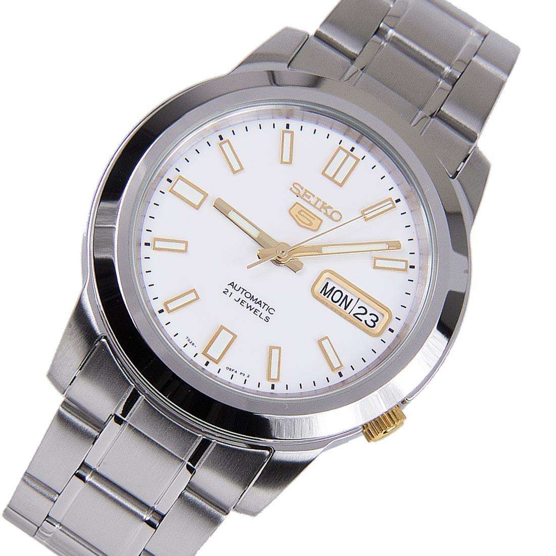Seiko 5 automatic watch angled front, white dial, gold indices, MON 23 date window