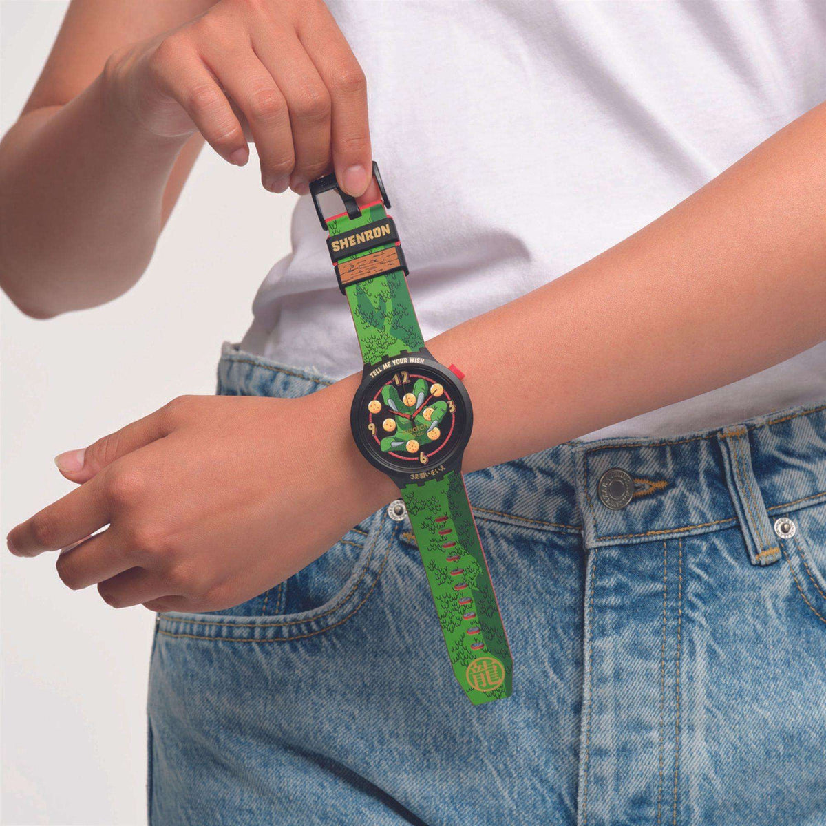 Unisex wristwatch on denim, green Shenron strap and round black dial