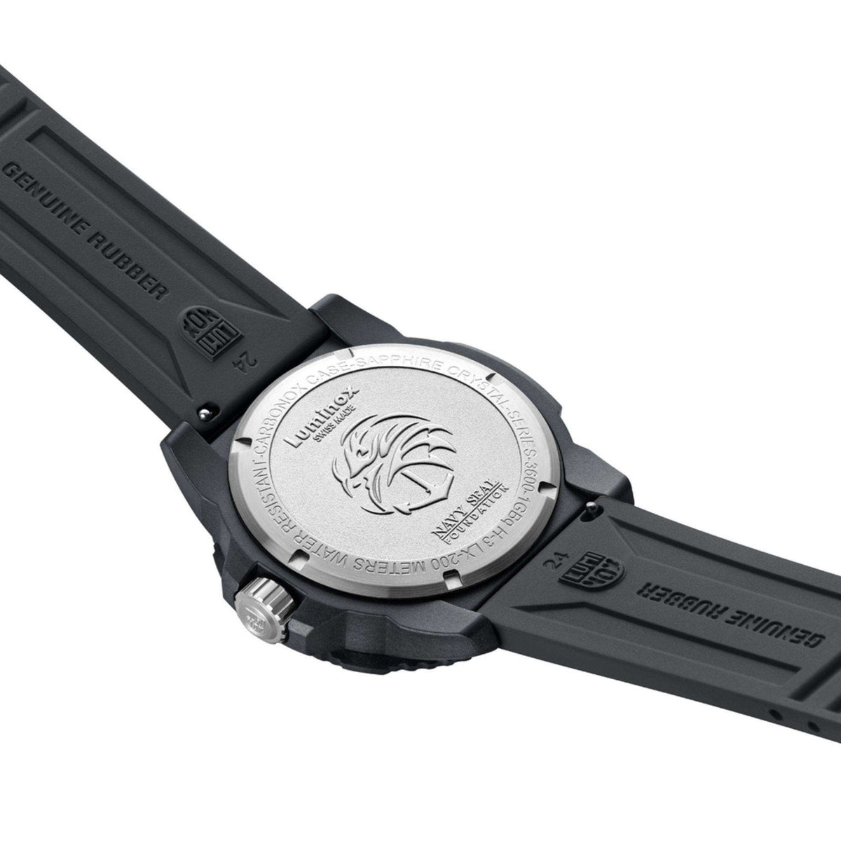 Luminox engraved caseback on black rubber strap, screw details around the back