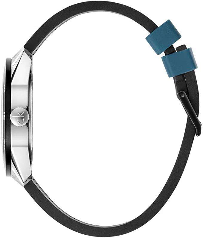 Quartz wristwatch with blue rubber strap and silver case, side view