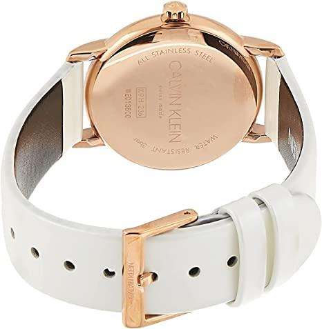 Ladies watch: gold-tone round case back, white leather strap, tang buckle