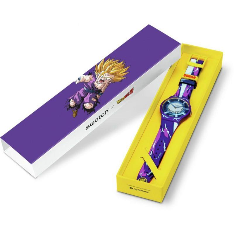 Silicone quartz watch with blue dial on purple patterned strap, in yellow gift box
