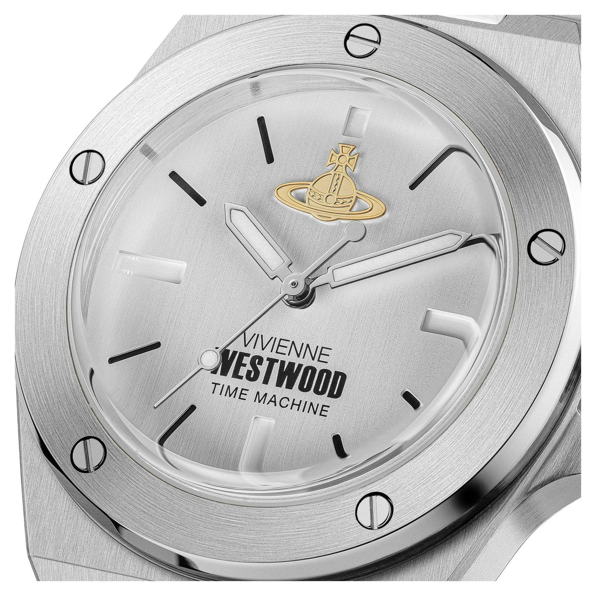 Grey watch dial close-up with gold crest, stick markers, and minute track