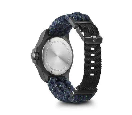 Quartz wristwatch showing case back with blue paracord band and black clasp