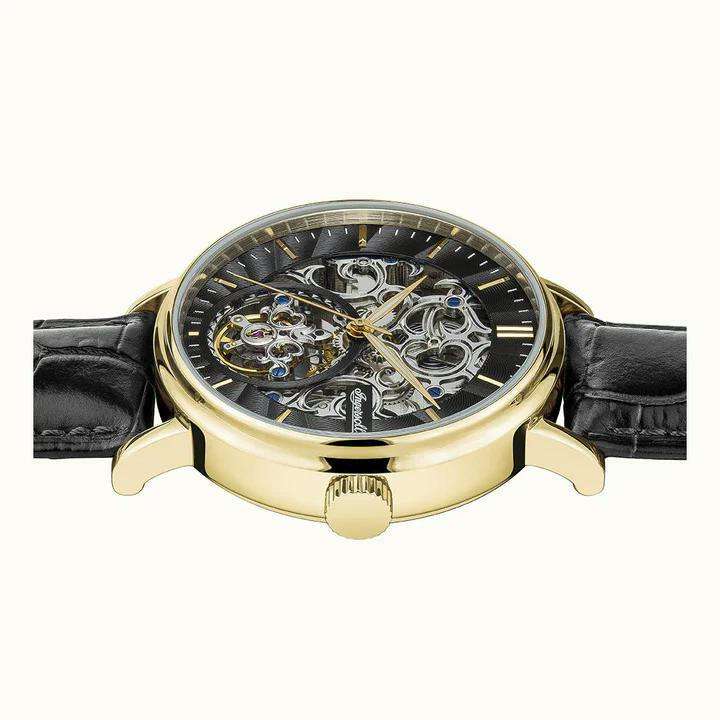 Ingersoll 1892 watch with skeleton dial, black leather strap, and gold bezel