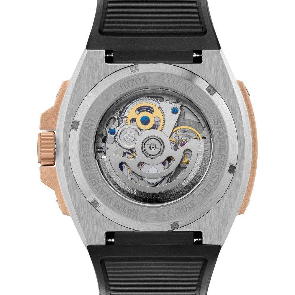 Men's automatic watch back view, exposed movement on silver case, black strap