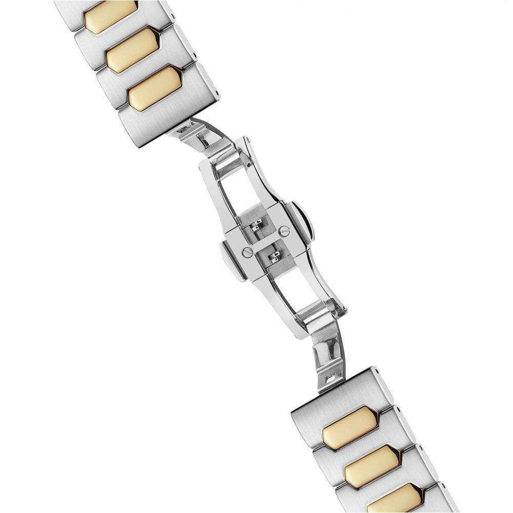 Two-tone stainless steel bracelet links with gold-toned inserts and clasp with safety latch.