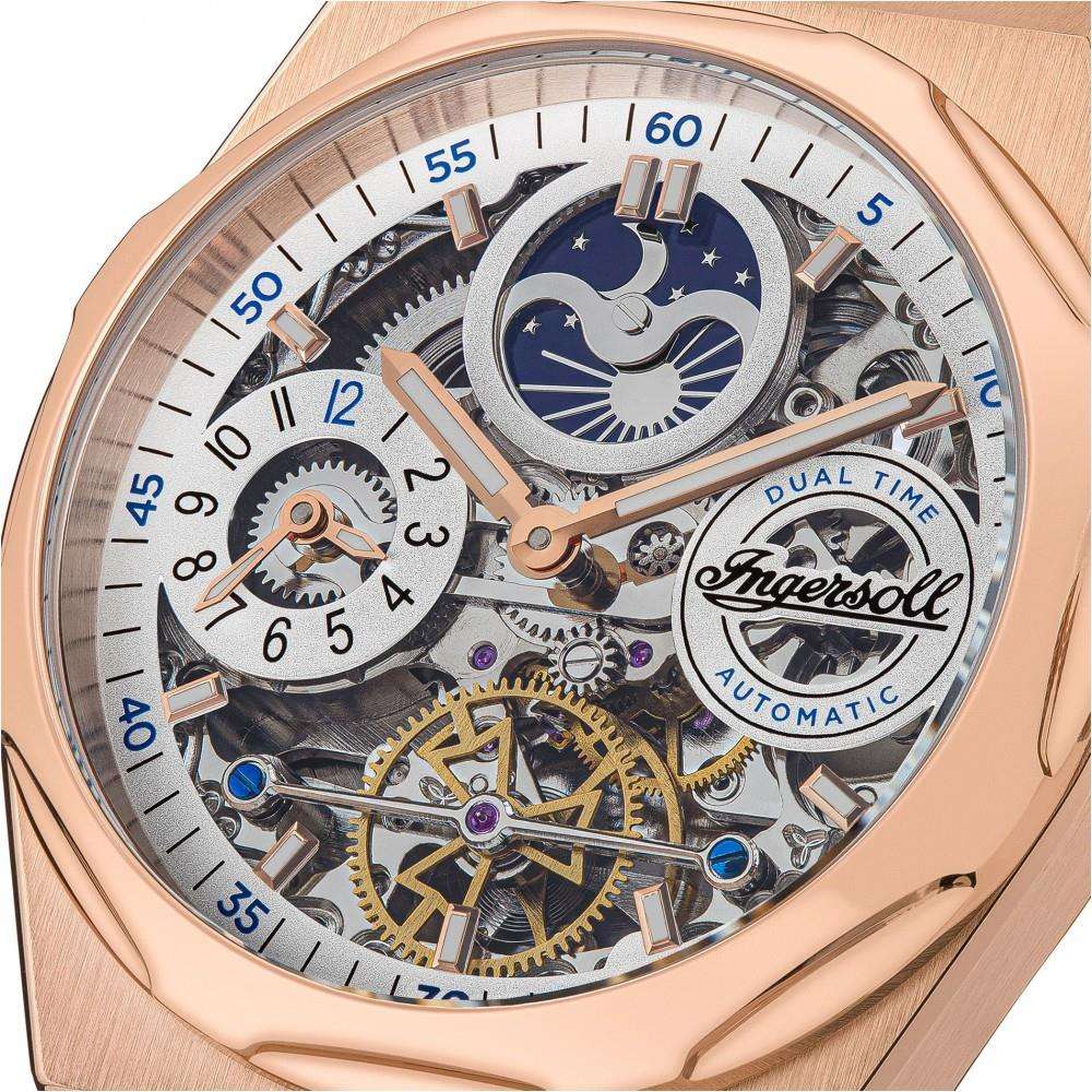Automatic men's watch close-up: white dial skeleton with blue moon subdial, rose-gold case