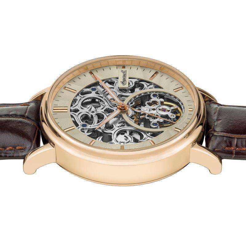 Men's Ingersoll skeleton automatic watch with champagne dial, ornate hands, and brown strap