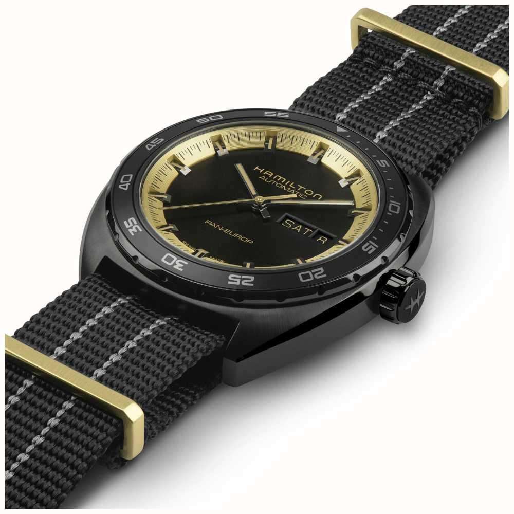 Hamilton automatic wristwatch on black-and-gray woven strap with gold bezel and date