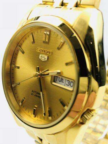 Side view of Seiko 5 automatic gold dial gold PVD stainless steel watch SNK366K1