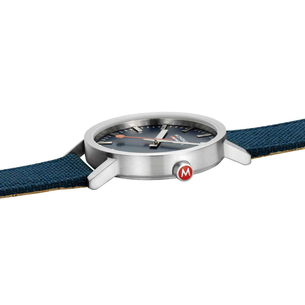 Mondaine Classic quartz watch side view with crown, deep blue dial, blue textile strap