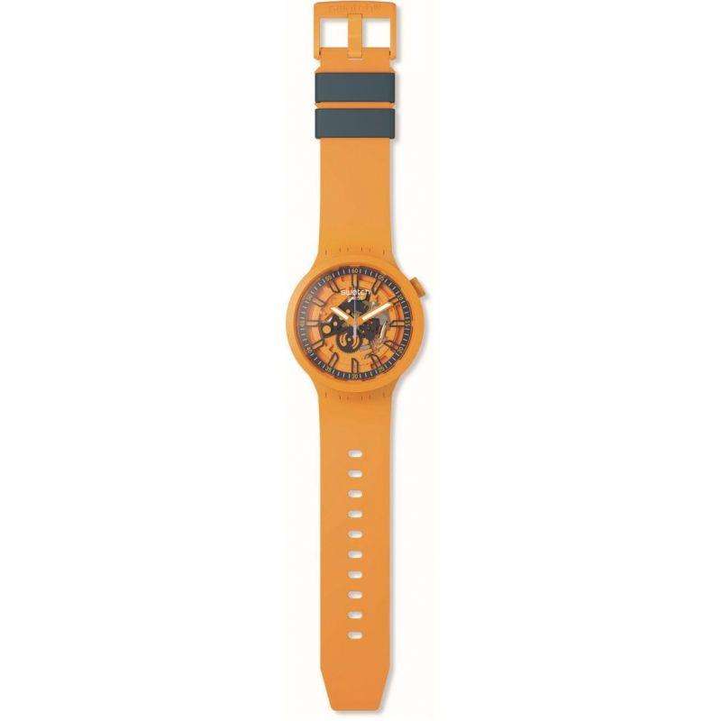 Orange Swatch skeleton dial watch with orange silicone strap and square buckle