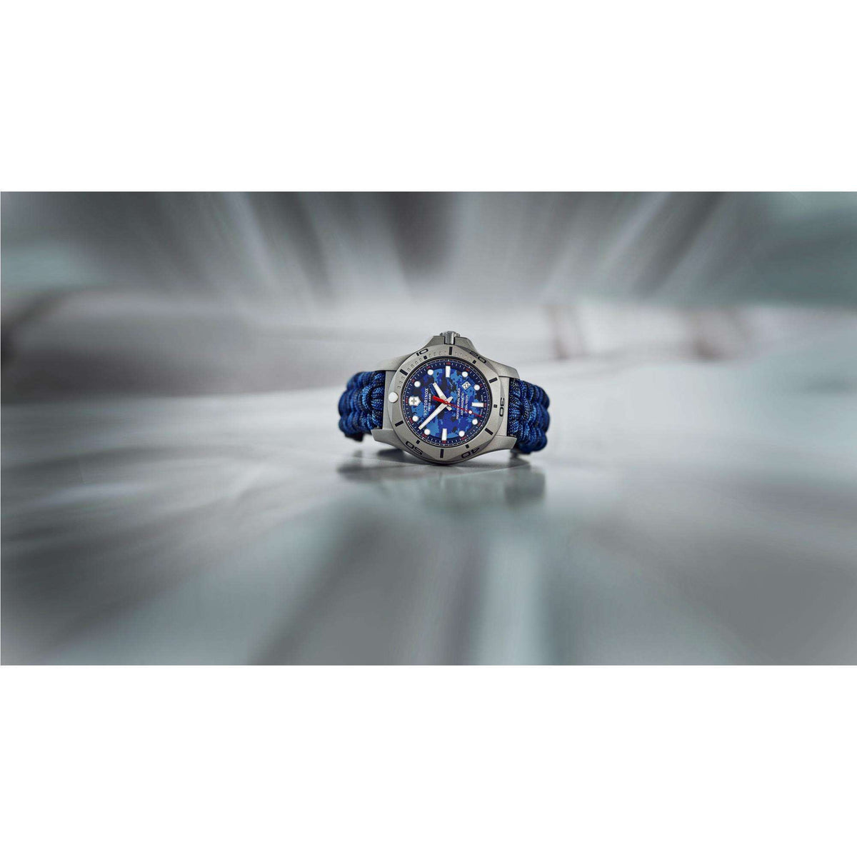Victorinox men’s quartz dive watch with blue dial and braided blue paracord strap