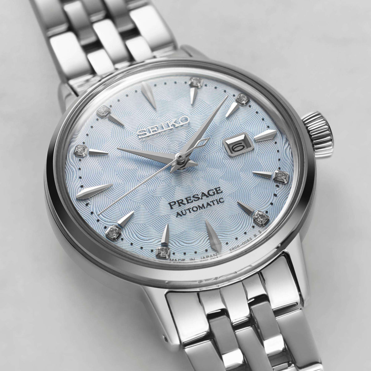 Seiko Presage SRE007J1 angled view of textured light blue dial