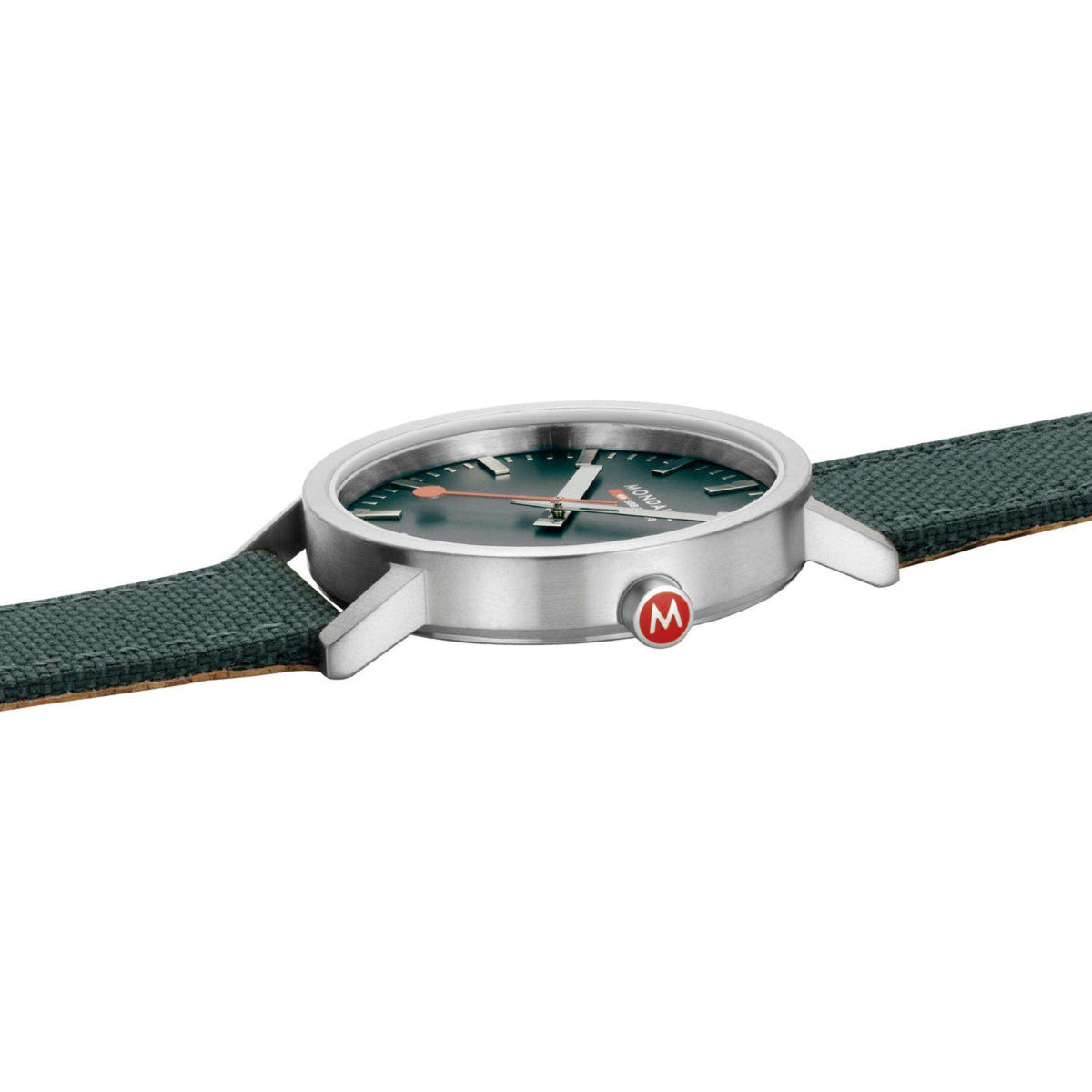 Mondaine Classic wristwatch viewed from the side with green fabric strap and silver case.
