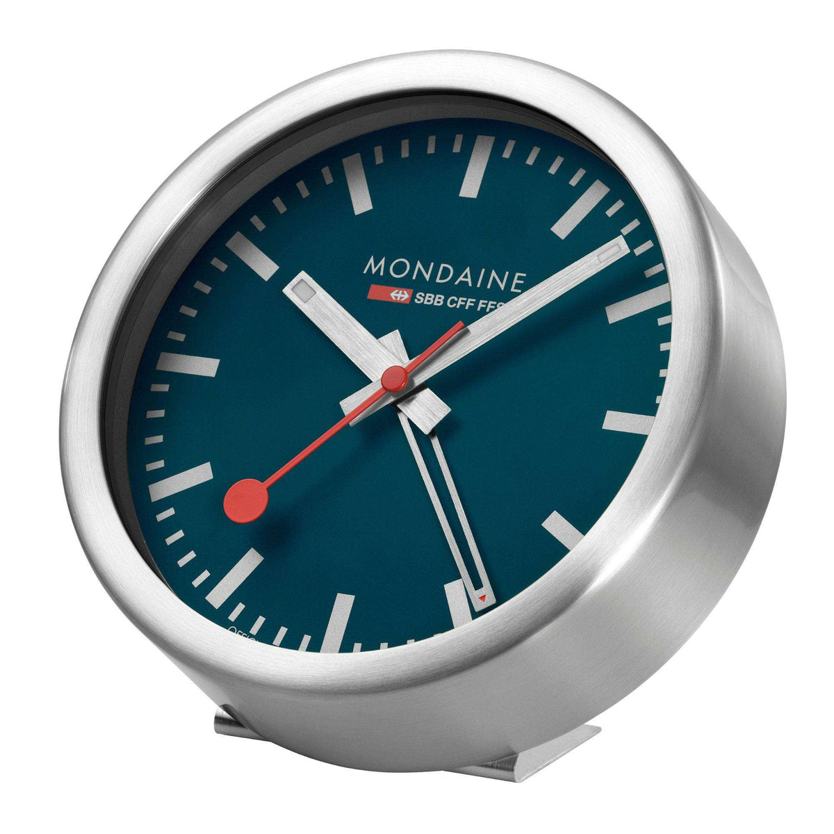 Blue dial table alarm clock in silver case, angled view with curved side foot