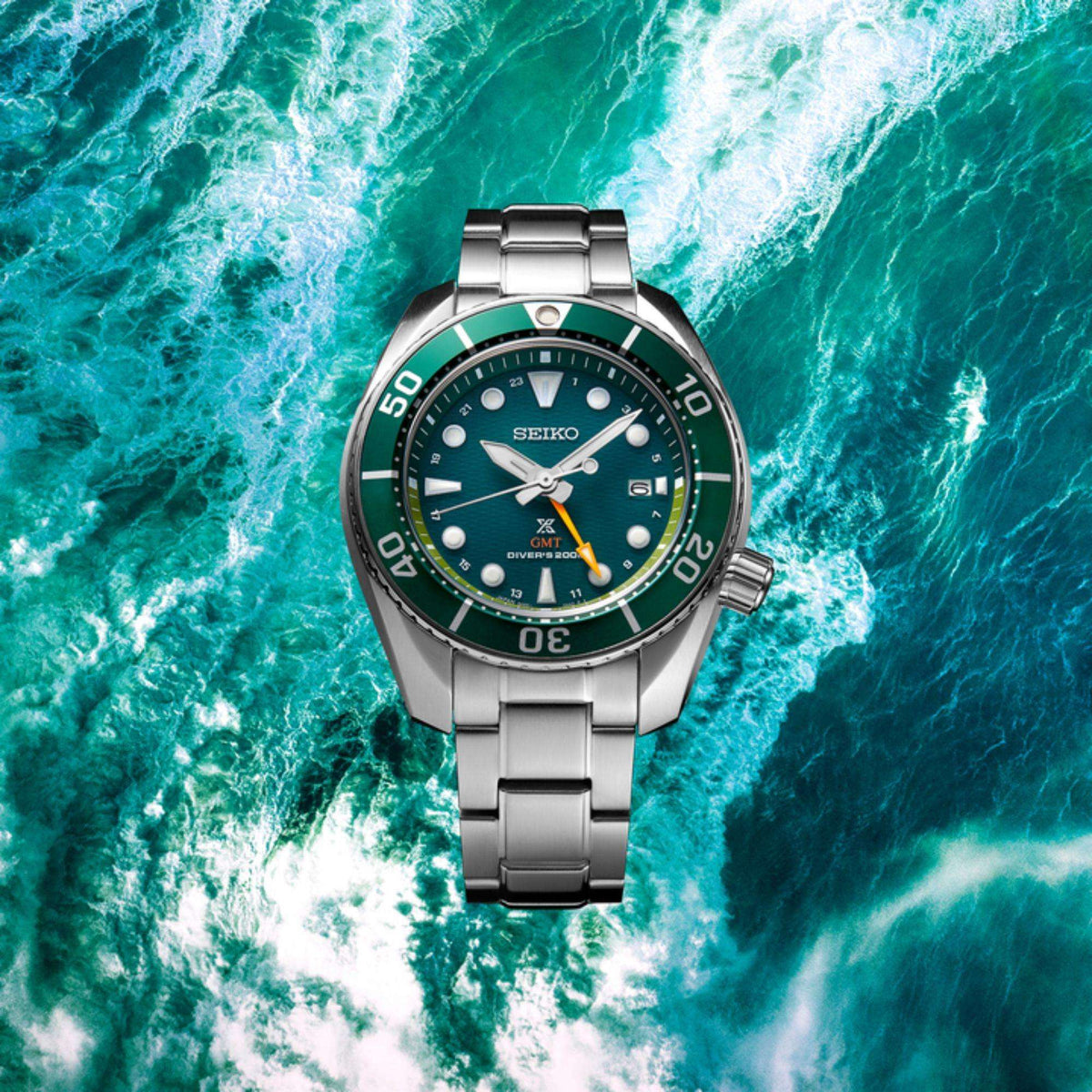 Seiko Prospex Aqua Sumo GMT watch SFK003J1 centered against a swirling, turquoise ocean water background