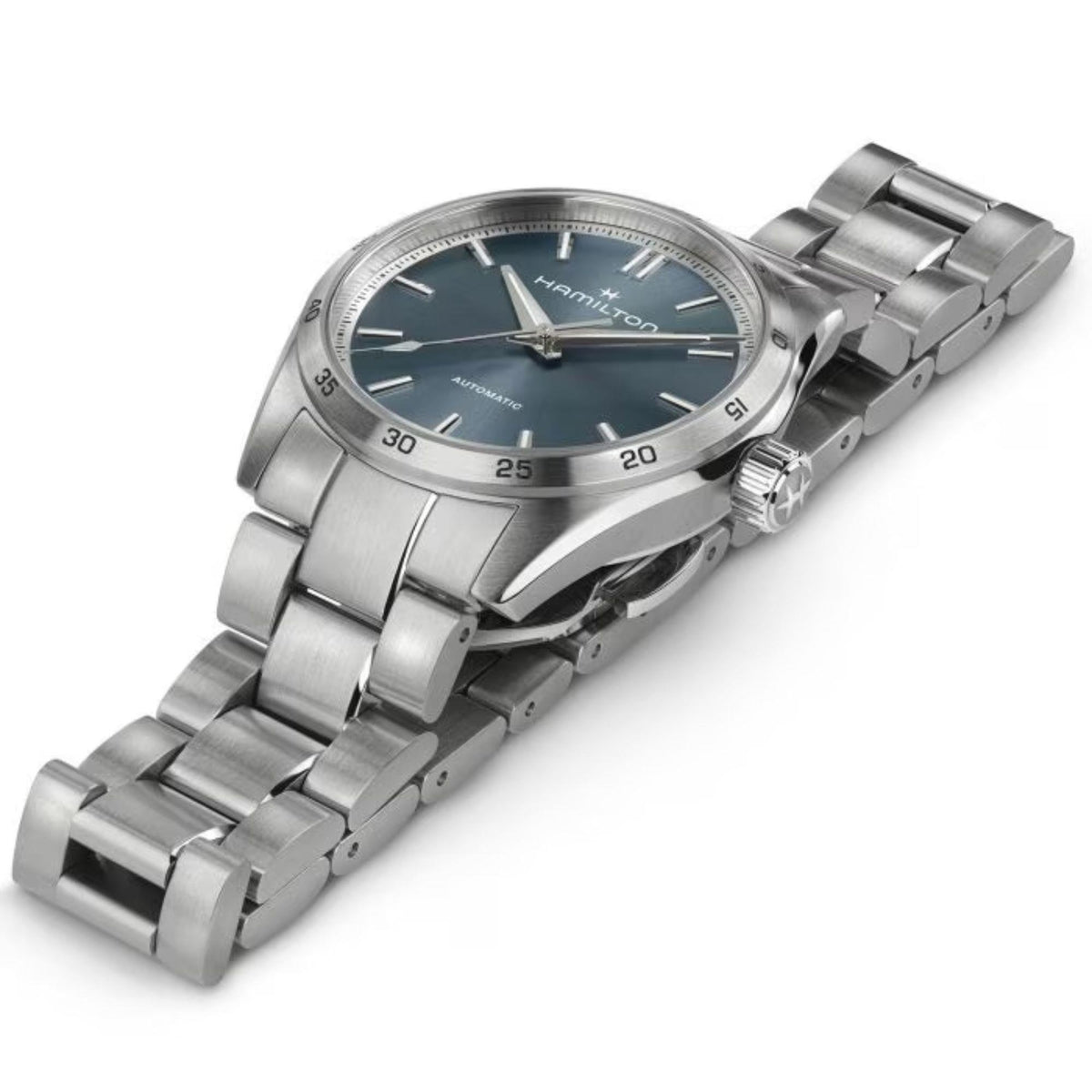 Stainless steel watch with blue dial, crown and link bracelet, side angle