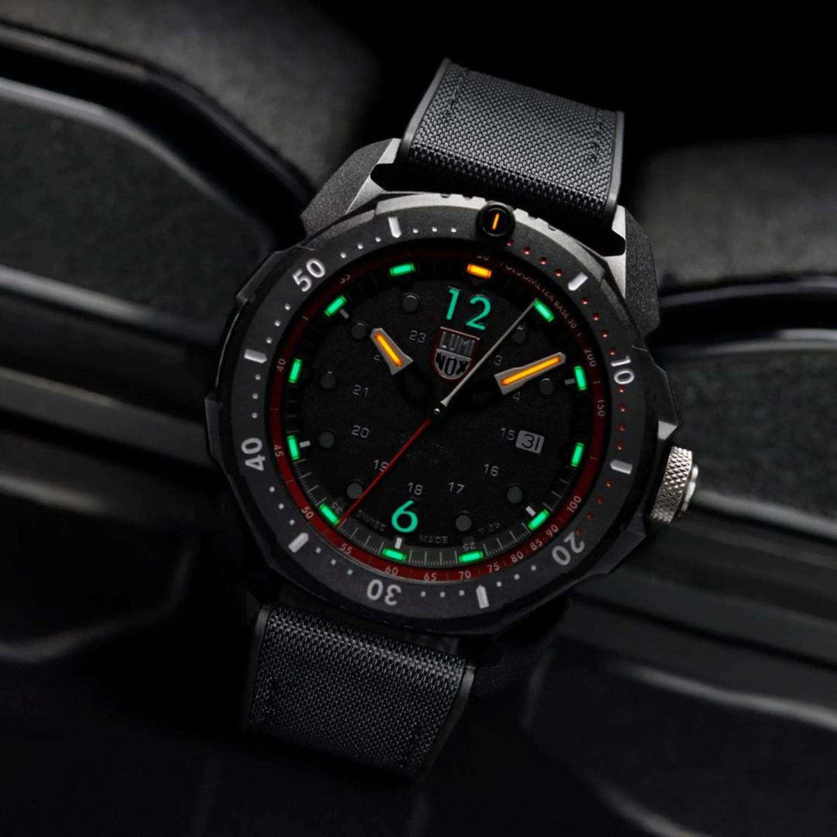 Luminox ICE SAR Arctic XL.1051 mens black/red dial watch angled view displaying luminous night display