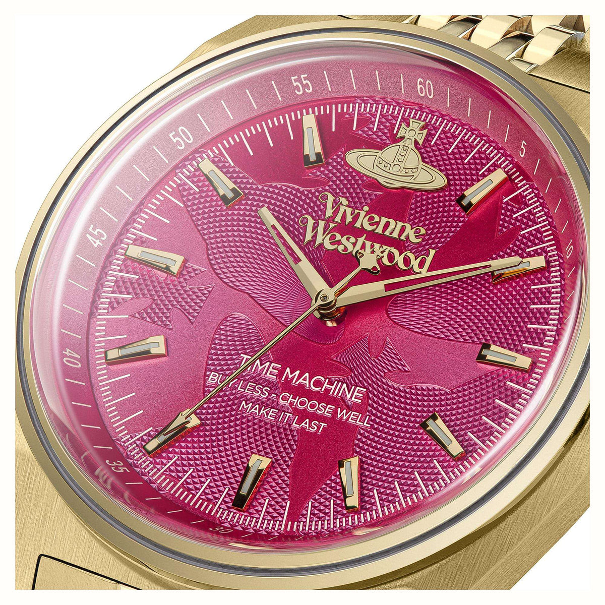 Pink patterned dial wristwatch with gold hands and markers, close-up on face
