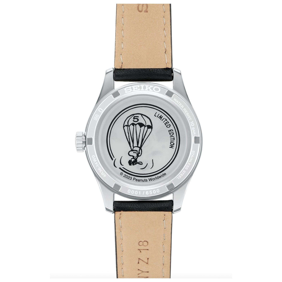 Limited edition watch caseback with parachute graphic, tan and black leather strap
