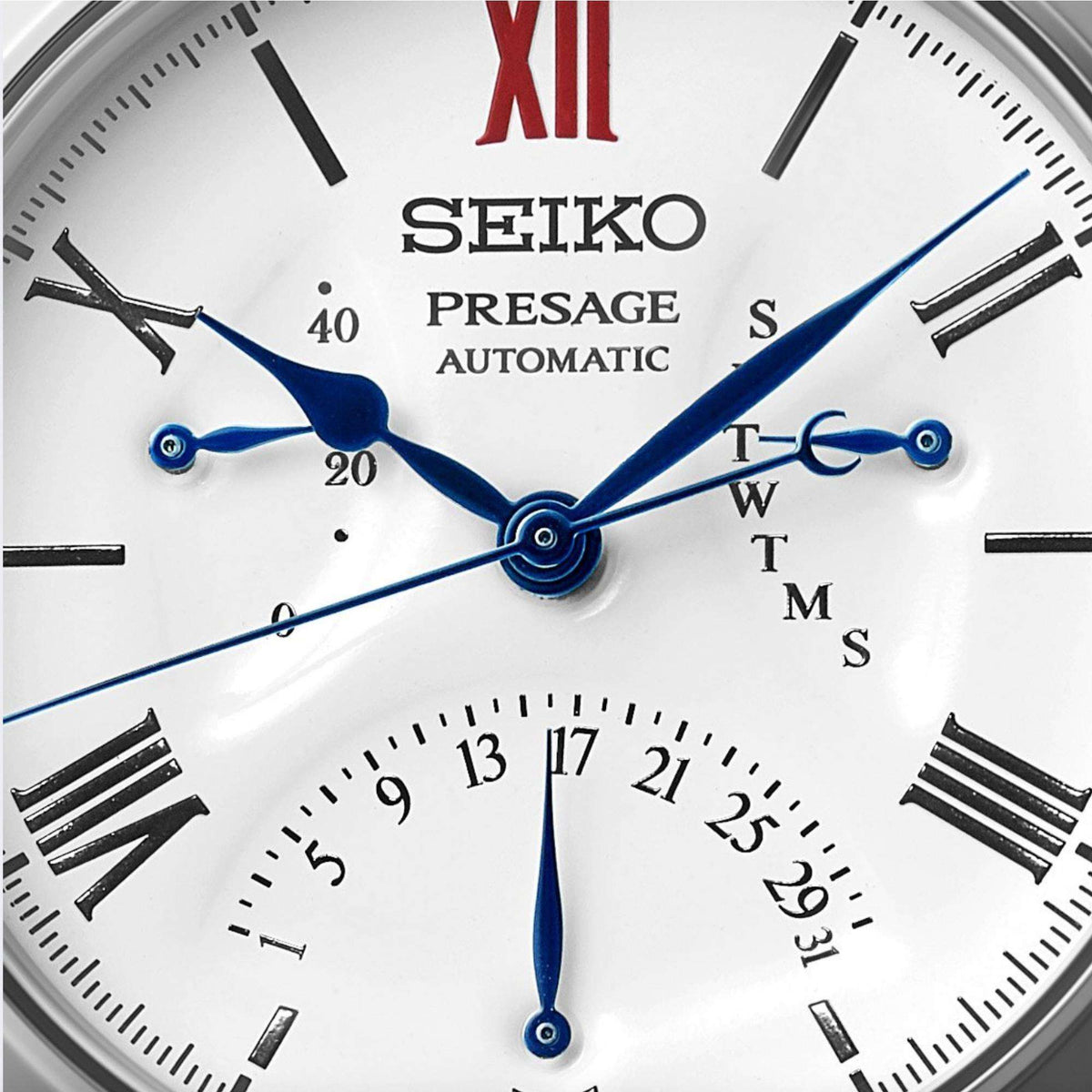 Seiko Presage SPB393J1 automatic watch white enamel dial and blue steel hands close up