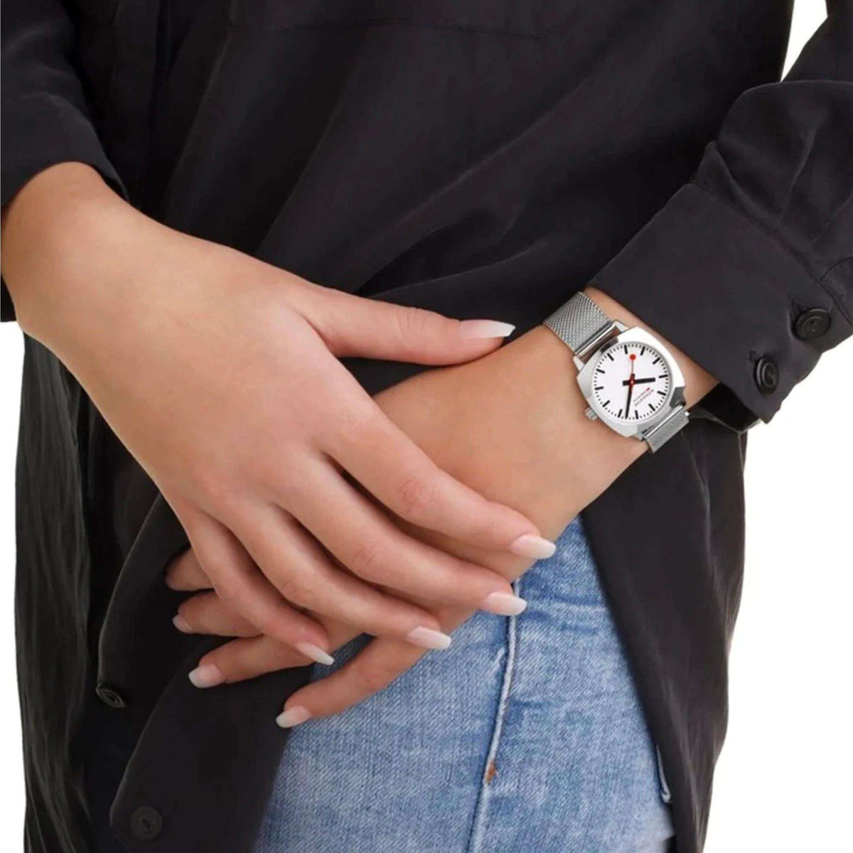 Mondaine cushion watch on wrist, white dial, steel mesh bracelet, red seconds
