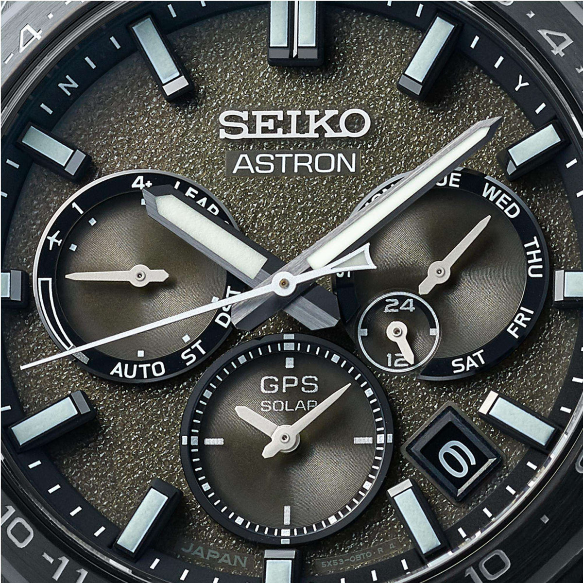 Close-up view of black dial, showcasing the multi-link indices and complex sub-dial layout.