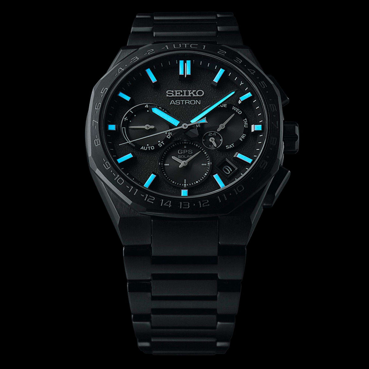 Lume shot of the watch in darkness, revealing the luminescent glow on the hands and hour markers.