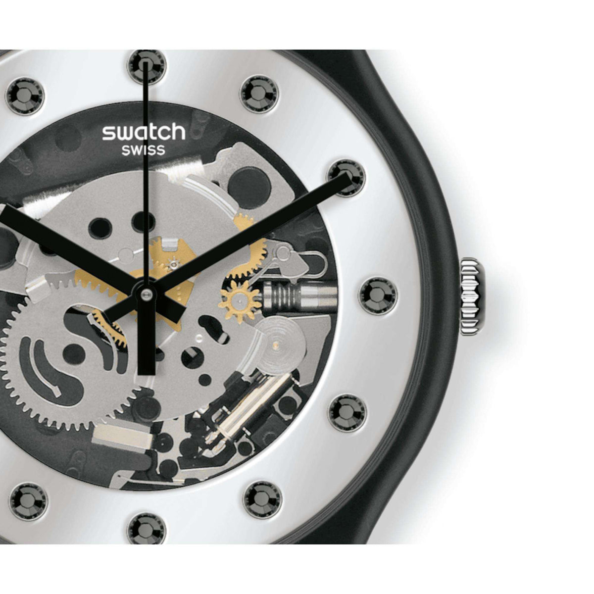 Close-up of silver skeleton dial with black hands, yellow accents, and metal gears