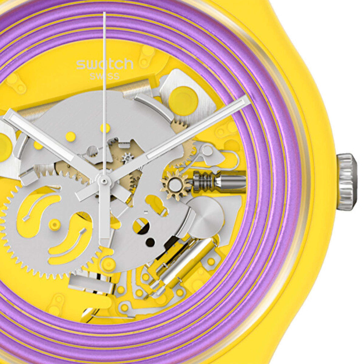Close-up of yellow watch dial with purple rings and exposed gears
