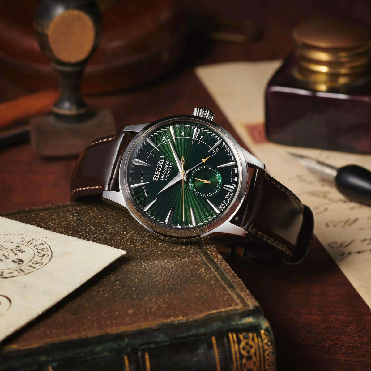 Seiko Presage SSA459J1 lifestyle display on vintage book