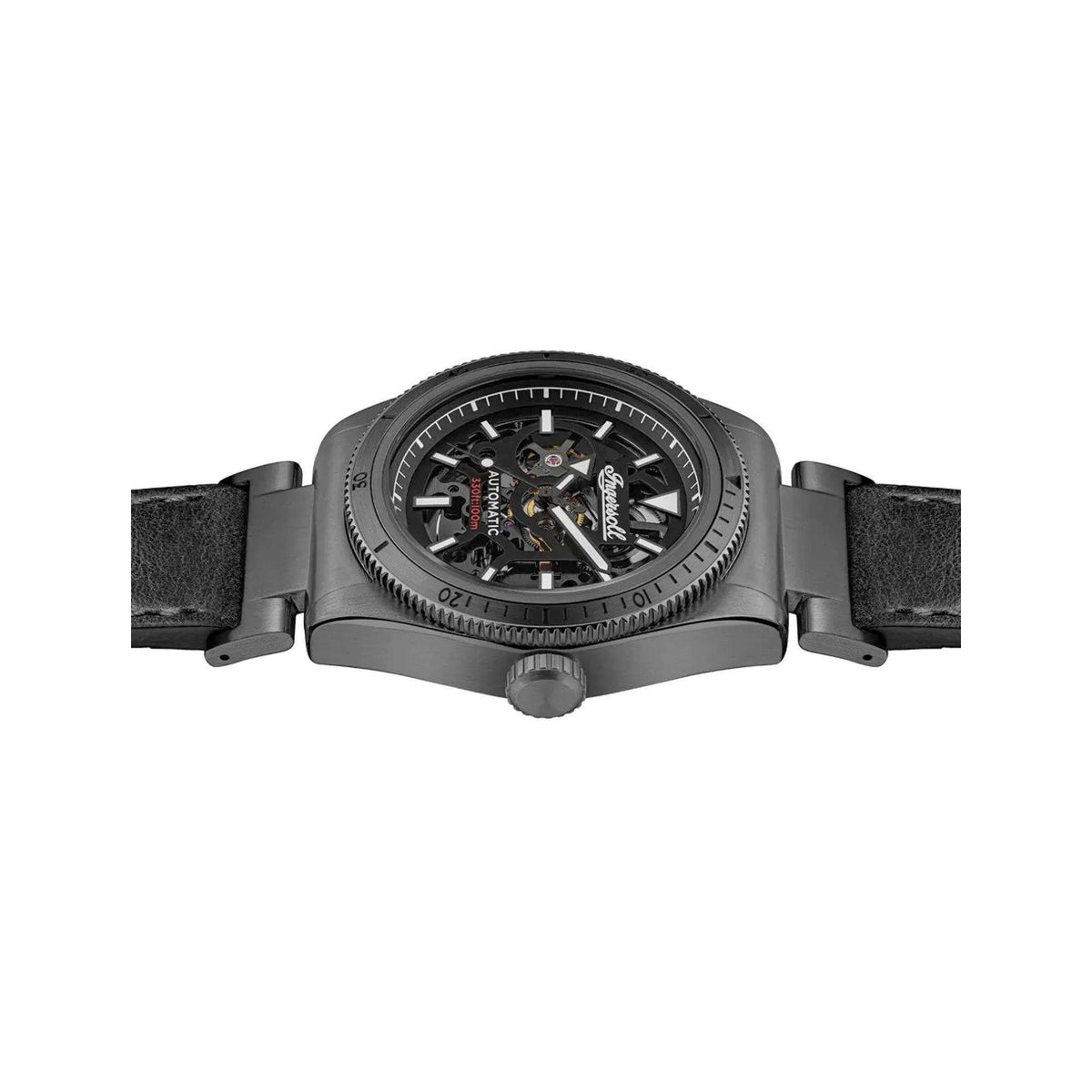 Automatic skeleton watch on black leather strap with textured bezel and crown