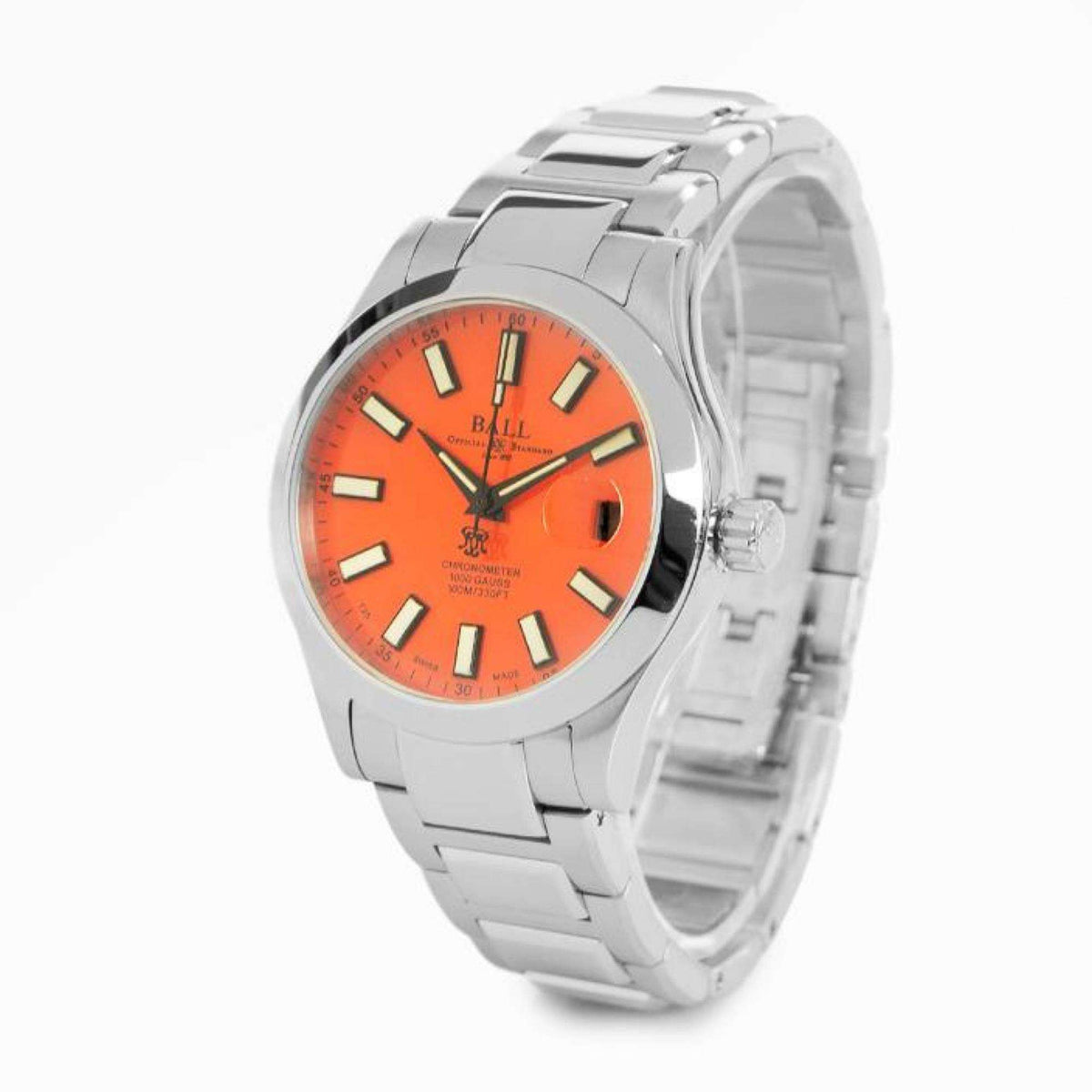 Stainless steel automatic watch with orange dial and metal bracelet, angled view