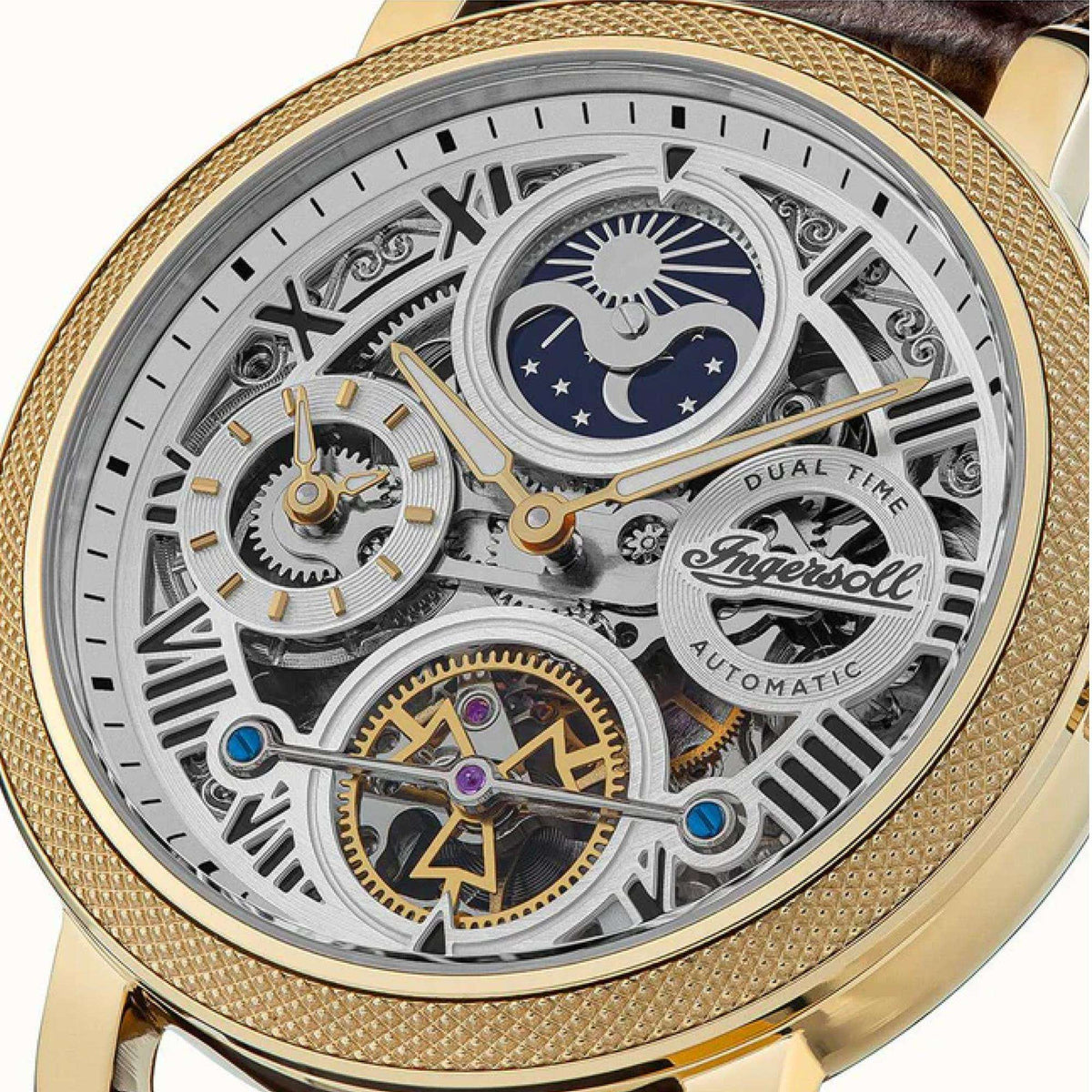 Men's automatic watch close-up of silver dial skeleton movement with gold-tone bezel