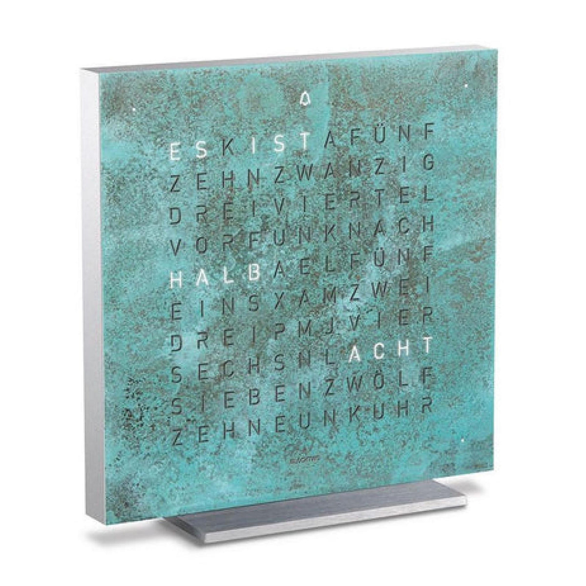 QLOCKTWO touch table clock with teal patina face and metal stand, vintage-style display