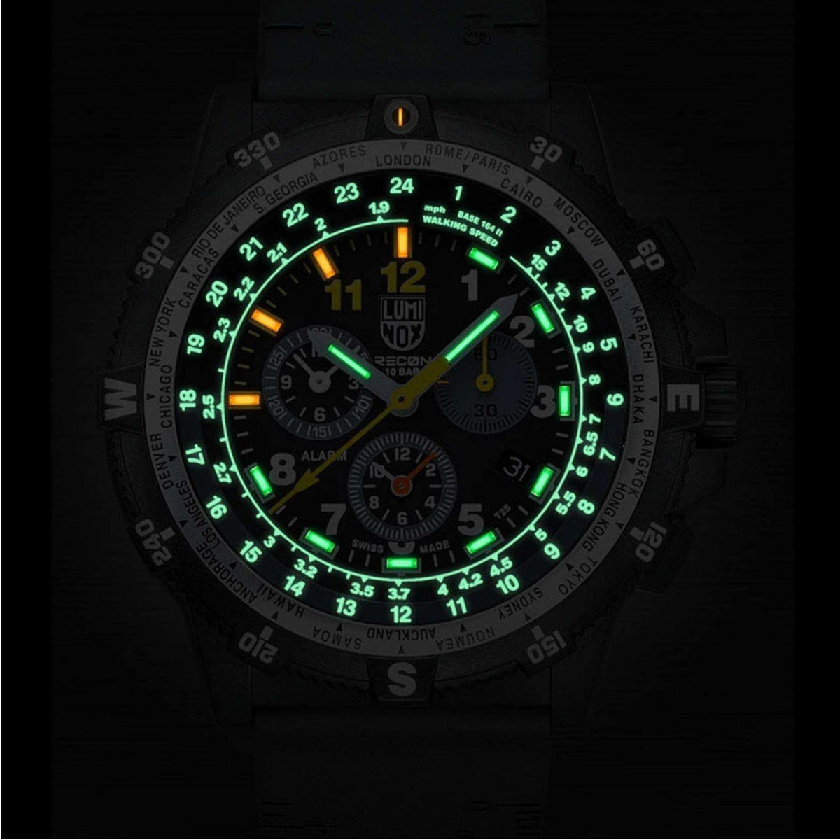 Black chronograph wristwatch with luminous green and orange dial markings, three subdials