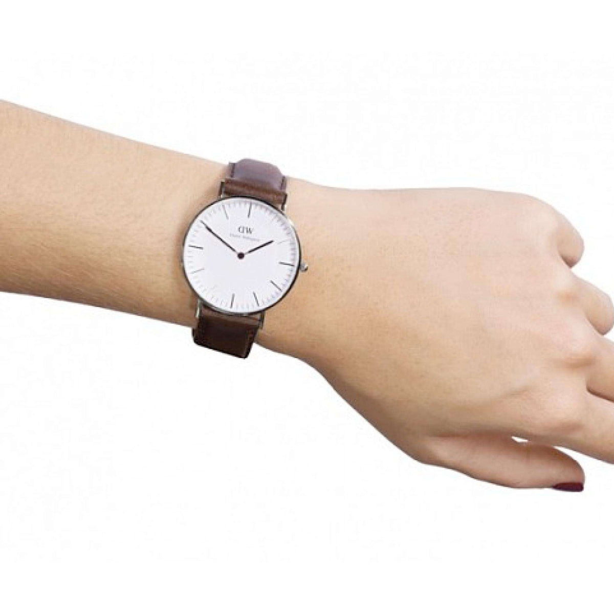 Daniel Wellington Classic quartz watch on wrist, white dial, brown leather strap