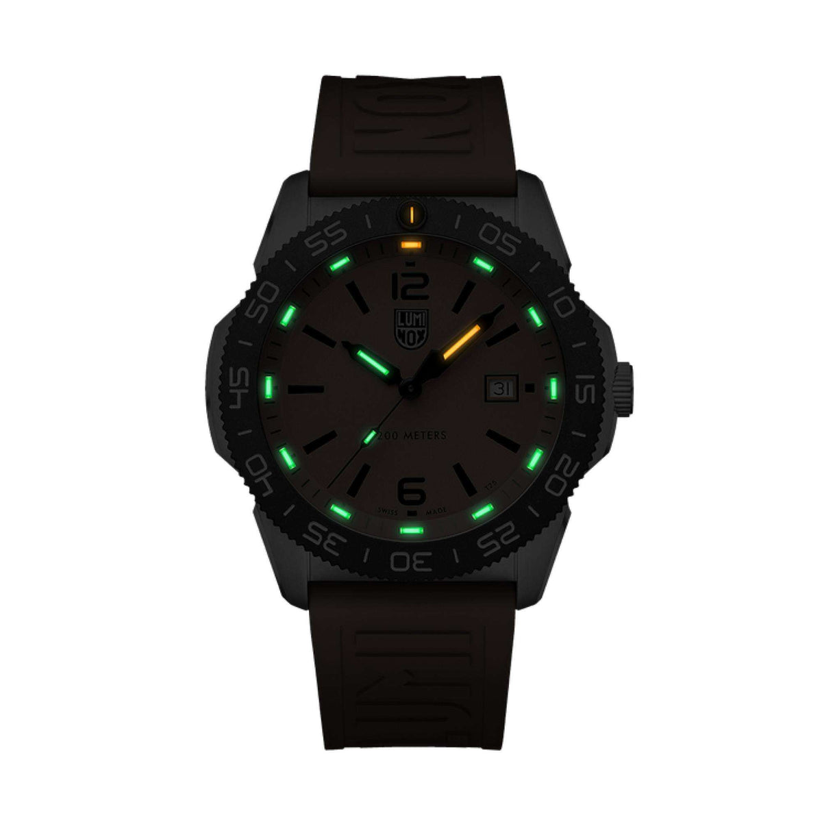 Diver watch with dark dial, glowing green markers, and black rubber strap, date window